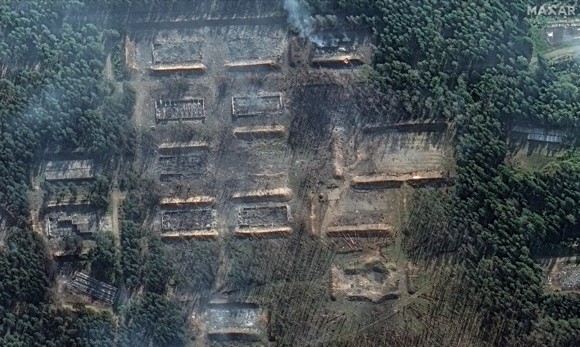 An aerial shot of destroyed ammunition storage buildings.